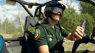 Law Enforcement Officer driving an OHRV