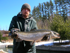 Man holding atlantic salmon 