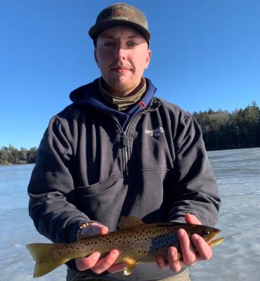 Ice Angler with Brown Trout