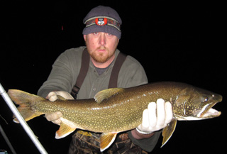 lake trout being held